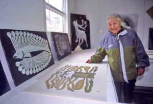 Kenojuak Ashevak with one of her 2009 collection prints. 